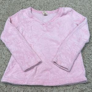 Pink sweater.
